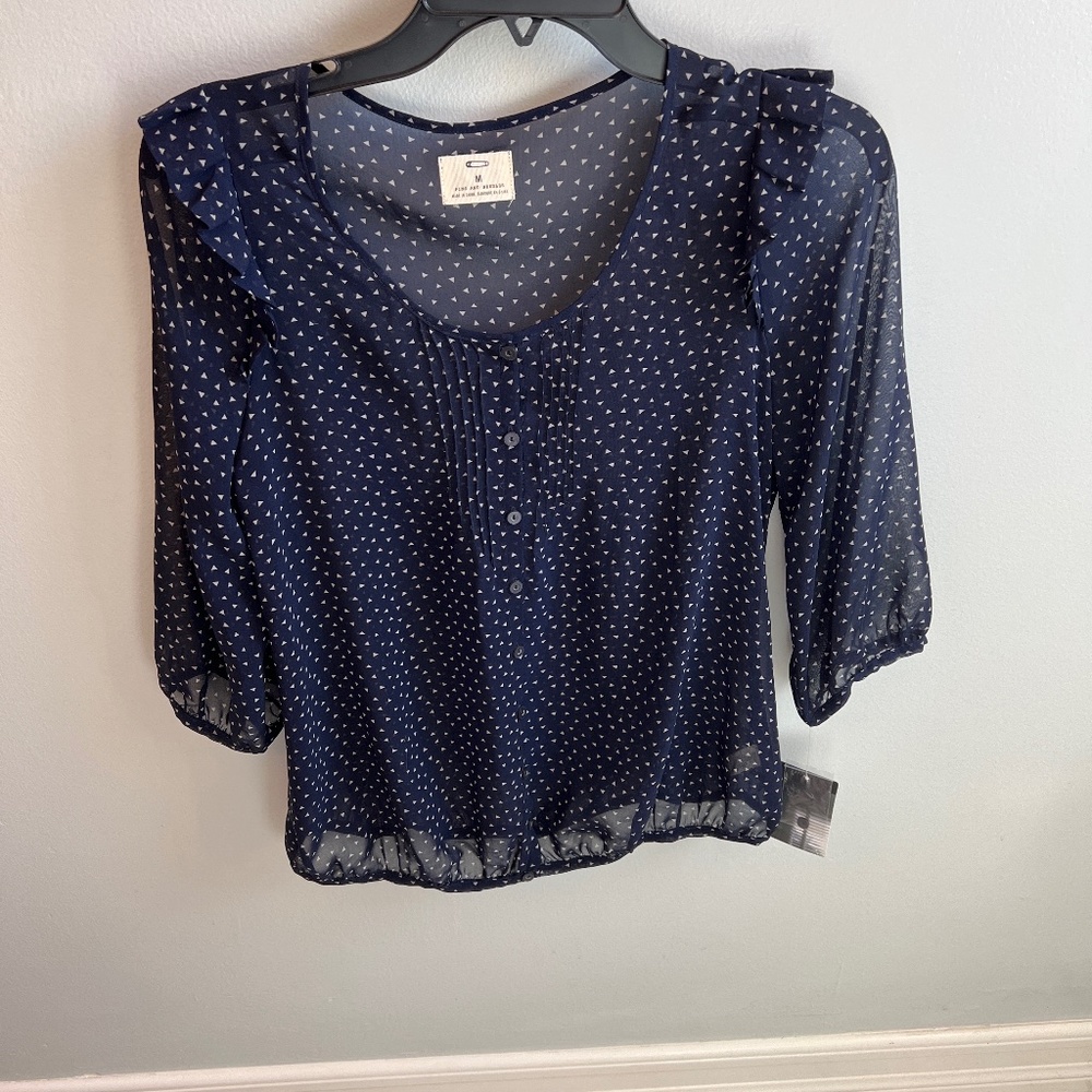 Sheer navy top with tiny white triangle print, medium